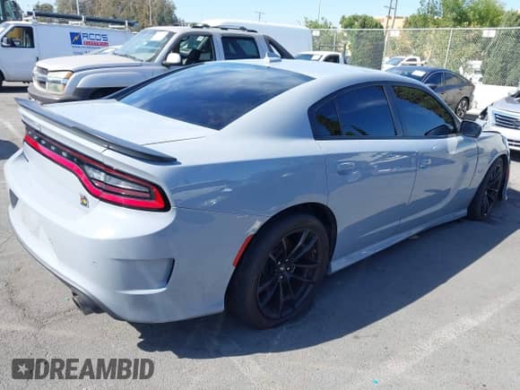 2021 Dodge Charger Scat Pack z VIN 2C3CDXGJ7MH594777, wystawiony jako IAAI lot #43044838 z przebiegiem 75 520 mil mil oraz . Historia ofert i sprzedaży dostępna na DreamBid. Obrazek 4.