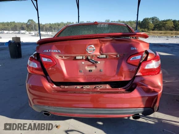 2016 Nissan Altima SR with VIN 1N4AL3AP8GC197670, listed as a Copart auction lot 82434905 with 70,672 mi miles and Salvage title. Bid and sale history available at DreamBid. Image 6.