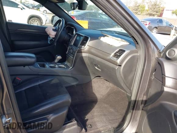 2018 Jeep Grand Cherokee Laredo E with VIN 1C4RJEAG9JC125219, listed as a IAAI auction lot 43438483 with 103,670 mi miles and . Bid and sale history available at DreamBid. Image 5.
