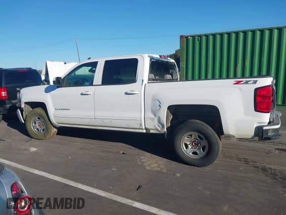 2018 Chevrolet Silverado 1500 LT with VIN 3GCUKREC3JG633219, listed as a IAAI auction lot 43452248 with Not provided miles and . Bid and sale history available at DreamBid. Image 15.