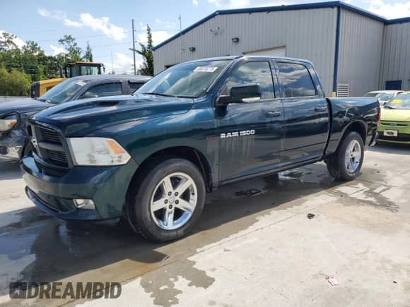 2011 Ram 1500 SLT with VIN 1D7RV1CT8BS590482, listed as a Copart auction lot 56678275 with 181,605 mi miles and Salvage title. Bid and sale history available at DreamBid. Image 1.