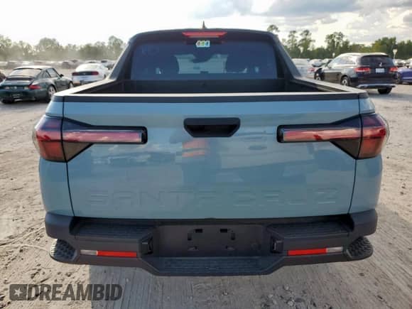 2024 Hyundai Santa Cruz SE с VIN 5NTJA4AE3RH083184, выставлен на аукционе Copart как лот 85854175 с пробегом 21 578 миль миль и Списание • Salvage title. История ставок и продаж доступна на DreamBid. Изображение 7.