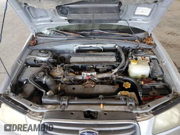 2004 Subaru Forester XT with VIN JF1SG69654H728506, listed as a Copart auction lot 68390785 with 168,326 mi miles and Salvage title. Bid and sale history available at DreamBid. Image 12.