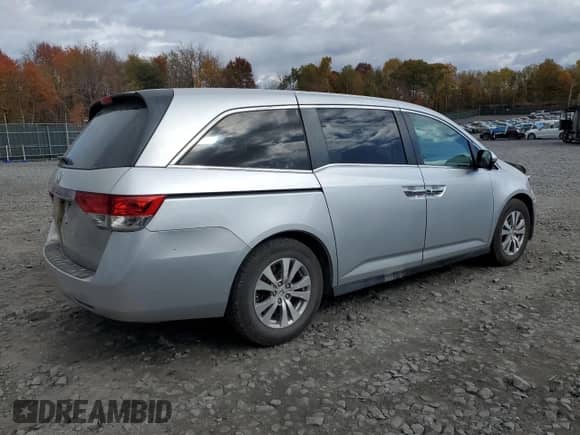 2014 Honda Odyssey EX with VIN 5FNRL5H41EB135161, listed as a Copart auction lot 82611715 with 120,764 mi miles and Salvage title. Bid and sale history available at DreamBid. Image 3.