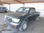 2000 Toyota Tacoma with VIN 4TAWM72N6YZ683194, listed as a IAAI auction lot 42550202 with 174,609 mi miles and . Bid and sale history available at DreamBid. Image 2.