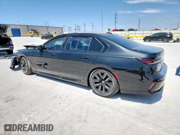 2024 BMW 7 Series 740i xDrive с VIN WBA33EH09RCS88132, выставлен на аукционе Copart как лот 70487665 с пробегом 7 104 миль миль и Списание • Salvage title. История ставок и продаж доступна на DreamBid. Изображение 2.