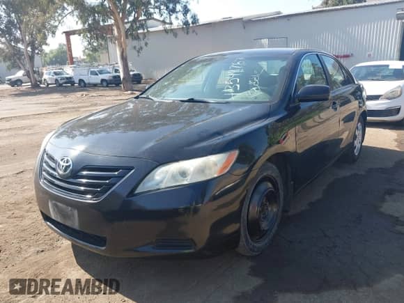 2007 Toyota Camry LE with VIN 4T1BE46KX7U723511, listed as a IAAI auction lot 43549787 with 107,164 mi miles and . Bid and sale history available at DreamBid. Image 2.