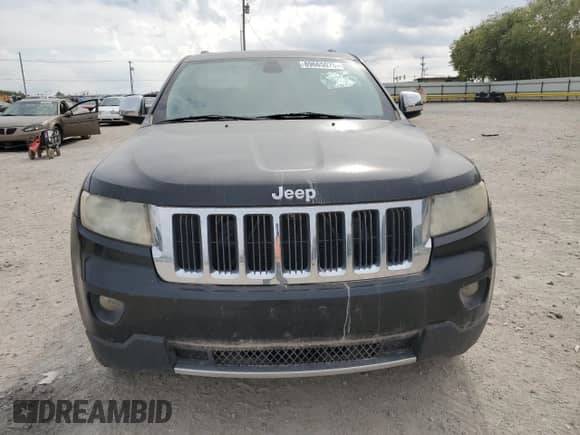 2013 Jeep Grand Cherokee Limited z VIN 1C4RJEBG4DC636503, wystawiony jako Copart lot #89665075 z przebiegiem 143 877 mil mil oraz Czysty tytuł • Clean title. Historia ofert i sprzedaży dostępna na DreamBid. Obrazek 5.