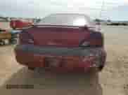 2004 Pontiac Grand Am SE with VIN 1G2NE52F44M563674, listed as a Copart auction lot 56692715 with 197,843 mi miles and Salvage title. Bid and sale history available at DreamBid. Image 6.