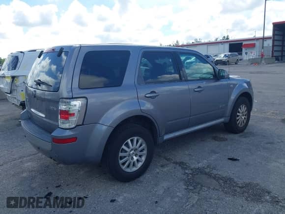 2008 Mercury Mariner Premier with VIN 4M2CU97118KJ53310, listed as a IAAI auction lot 43251176 with 22,170 mi miles and . Bid and sale history available at DreamBid. Image 4.