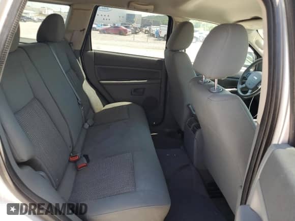 2007 Jeep Grand Cherokee Laredo z VIN 1J8GS48K67C661359, wystawiony jako Copart lot #58337855 z przebiegiem 169 674 mil mil oraz Szkoda całkowita • Salvage title. Historia ofert i sprzedaży dostępna na DreamBid. Obrazek 11.