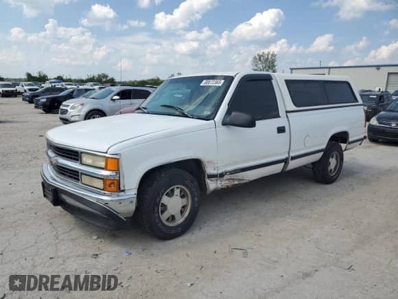 1997 Chevrolet Silverado 1500 with VIN 1GCEC14RXVZ124680, listed as a Copart auction lot 80872365 with 158,021 mi miles and Salvage title. Bid and sale history available at DreamBid. Image 1.