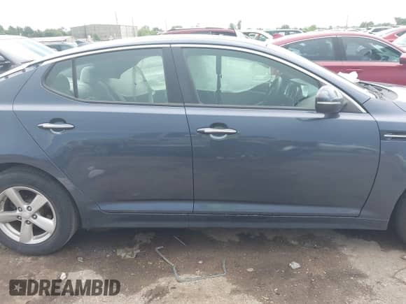 2015 Kia Optima LX with VIN 5XXGM4A73FG488602, listed as a IAAI auction lot 43008817 with 87,198 mi miles and . Bid and sale history available at DreamBid. Image 13.
