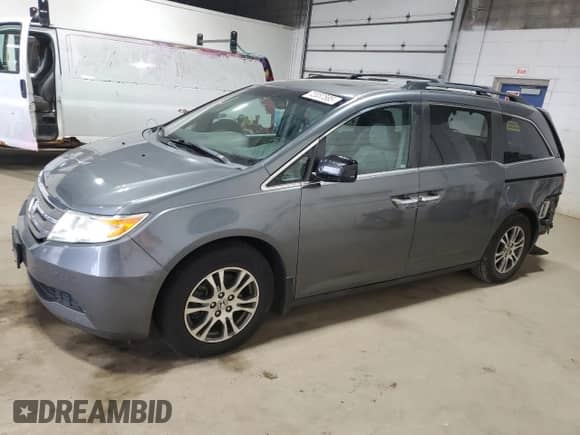 2013 Honda Odyssey EX-L с VIN 5FNRL5H61DB022164, выставлен на аукционе Copart как лот 72037585 с пробегом 139 888 миль миль и Списание • Salvage title. История ставок и продаж доступна на DreamBid. Изображение 1.