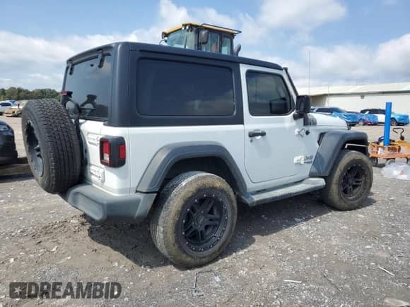 2020 Jeep Wrangler Sport S with VIN 1C4GJXAG5LW302823, listed as a Copart auction lot 71611065 with 67,430 mi miles and Salvage title. Bid and sale history available at DreamBid. Image 3.