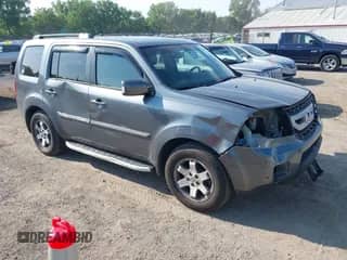 2010 Honda Pilot Touring with VIN 5FNYF4H88AB012001, listed as a IAAI auction lot 42635771 with 287,115 mi miles and . Bid and sale history available at DreamBid. Image 1.