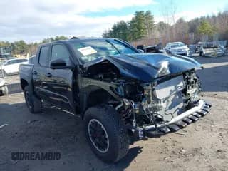 2024 Toyota Tacoma SR5 with VIN 3TMLB5JN0RM008463, listed as a IAAI auction lot 40979020 with 4,710 mi miles and . Bid and sale history available at DreamBid. Image 1.