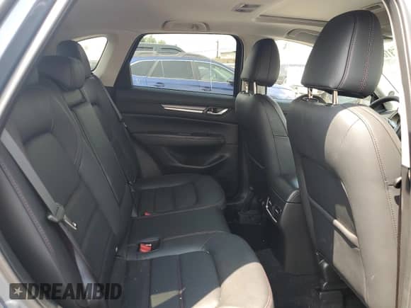 2025 Mazda CX-5 S Carbon Edition с VIN JM3KFBCMXS0655066, выставлен на аукционе Copart как лот 66453165 с пробегом 1 559 миль миль и Списание • Salvage title. История ставок и продаж доступна на DreamBid. Изображение 11.