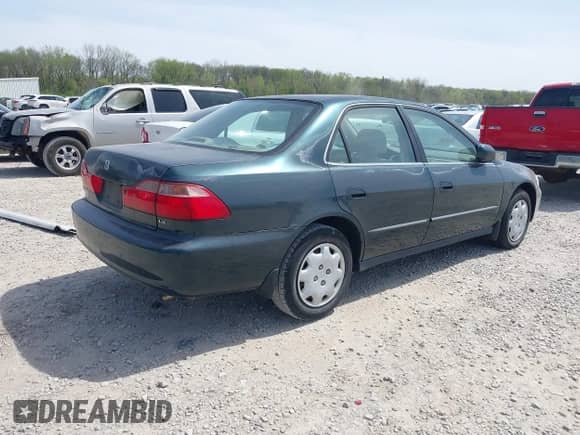 2000 Honda Accord LX z VIN 1HGCG5644YA009128, wystawiony jako IAAI lot #42066193 z przebiegiem 171 219 mil mil oraz . Historia ofert i sprzedaży dostępna na DreamBid. Obrazek 4.