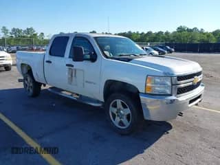 2013 Chevrolet Silverado 2500HD Work Truck with VIN 1GC1KVC89DF190039, listed as a IAAI auction lot 42182067 with 243,366 mi miles and . Bid and sale history available at DreamBid. Image 1.