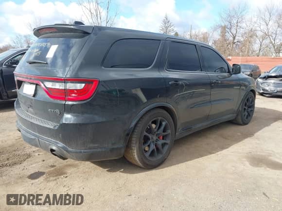 2021 Dodge Durango SRT Hellcat with VIN 1C4SDJH95MC692590, listed as a IAAI auction lot 42030998 with 24,685 mi miles and . Bid and sale history available at DreamBid. Image 4.