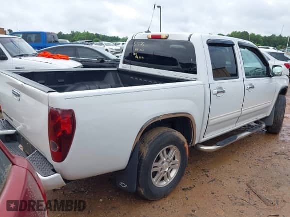 2011 Chevrolet Colorado 1LT z VIN 1GCHTCFE2B8127044, wystawiony jako IAAI lot #42245471 z przebiegiem 224 115 mil mil oraz . Historia ofert i sprzedaży dostępna na DreamBid. Obrazek 4.