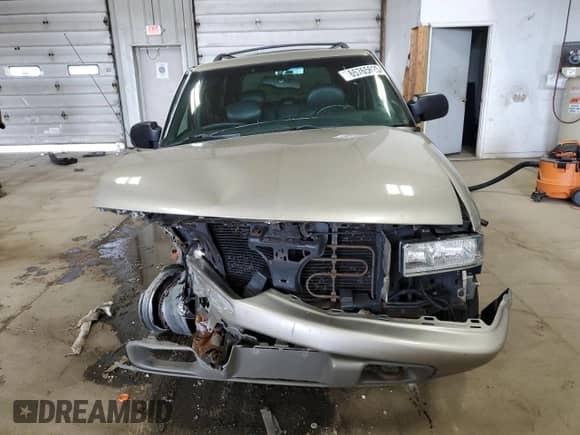 2002 Chevrolet Blazer LS с VIN 1GNDT13W42K189958, выставлен на аукционе Copart как лот 65765625 с пробегом Не указан миль и На запчасти • Non repairable. История ставок и продаж доступна на DreamBid. Изображение 5.