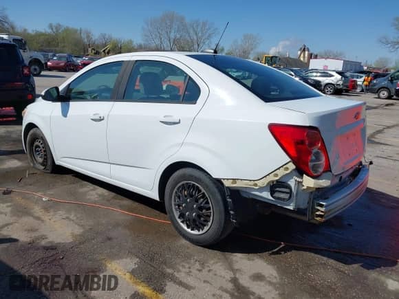 2015 Chevrolet Sonic LS with VIN 1G1JB5SHXF4158869, listed as a IAAI auction lot 41966084 with 151,987 mi miles and . Bid and sale history available at DreamBid. Image 3.