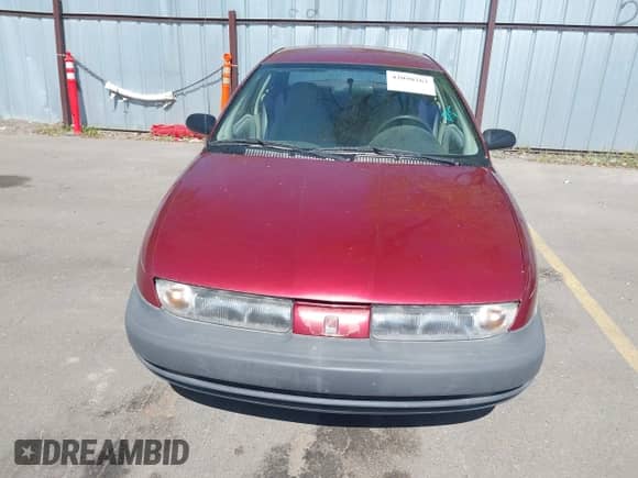 1996 Saturn SL z VIN 1G8ZG5289TZ214790, wystawiony jako IAAI lot #42090262 z przebiegiem 197 485 mil mil oraz . Historia ofert i sprzedaży dostępna na DreamBid. Obrazek 6.
