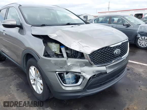 2016 Kia Sorento LX z VIN 5XYPG4A32GG127234, wystawiony jako IAAI lot #43027197 z przebiegiem 92 328 mil mil oraz . Historia ofert i sprzedaży dostępna na DreamBid. Obrazek 6.
