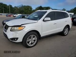 2012 Hyundai Santa Fe Limited с VIN 5XYZKDAG4CG161101, выставлен на аукционе Copart как лот 71007885 с пробегом 182 304 миль миль и Чистый • Clean title. История ставок и продаж доступна на DreamBid. Изображение 1.