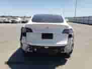 2023 Tesla Model Y Long Range с VIN 7SAYGDEE0PF637947, выставлен на аукционе Copart как лот 61927575 с пробегом 57 538 миль миль и Списание • Salvage title. История ставок и продаж доступна на DreamBid. Изображение 6.