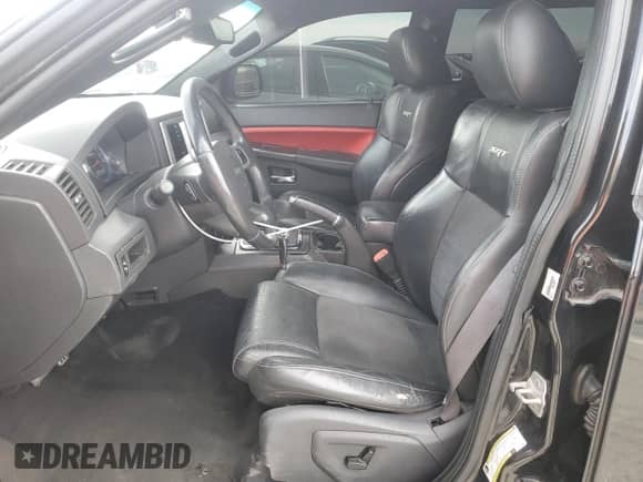 2008 Jeep Grand Cherokee SRT-8 z VIN 1J8HR78398C214004, wystawiony jako Copart lot #48760375 z przebiegiem 165 318 mil mil oraz Szkoda całkowita • Salvage title. Historia ofert i sprzedaży dostępna na DreamBid. Obrazek 7.