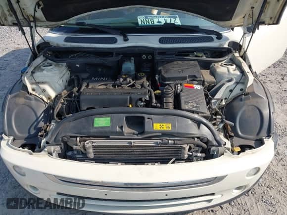 2006 MINI Hardtop with VIN WMWRC33506TK18077, listed as a IAAI auction lot 42583190 with 170,819 mi miles and . Bid and sale history available at DreamBid. Image 10.