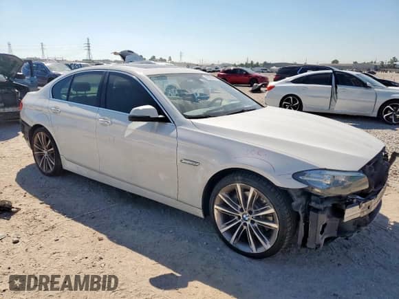 2014 BMW 5 Series 535d with VIN WBAXA5C57ED690939, listed as a Copart auction lot 81805135 with 169,707 mi miles and Salvage title. Bid and sale history available at DreamBid. Image 4.