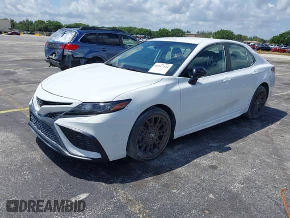 2023 Toyota Camry SE с VIN 4T1G11AK5PU093789, выставлен на аукционе IAAI как лот 41917924 с пробегом Не указан миль и . История ставок и продаж доступна на DreamBid. Изображение 2.