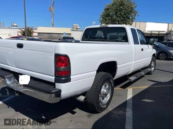 2002 Dodge 2500 z VIN 3B7KC23C22M293949, wystawiony jako Copart lot #73561764 z przebiegiem 88 970 mil mil oraz Czysty tytuł • Clean title. Historia ofert i sprzedaży dostępna na DreamBid. Obrazek 4.