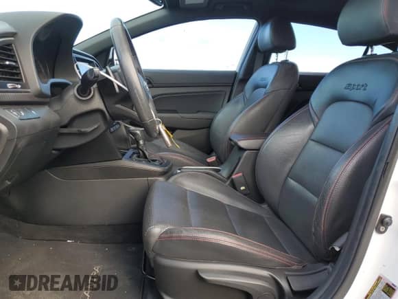 2018 Hyundai Elantra Sport с VIN KMHD04LB3JU451628, выставлен на аукционе Copart как лот 82335675 с пробегом 94 662 миль миль и Списание • Salvage title. История ставок и продаж доступна на DreamBid. Изображение 7.