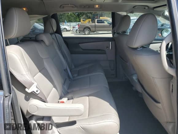 2016 Honda Odyssey Touring Elite z VIN 5FNRL5H94GB024134, wystawiony jako Copart lot #80256095 z przebiegiem 136 974 mil mil oraz Szkoda całkowita • Salvage title. Historia ofert i sprzedaży dostępna na DreamBid. Obrazek 11.