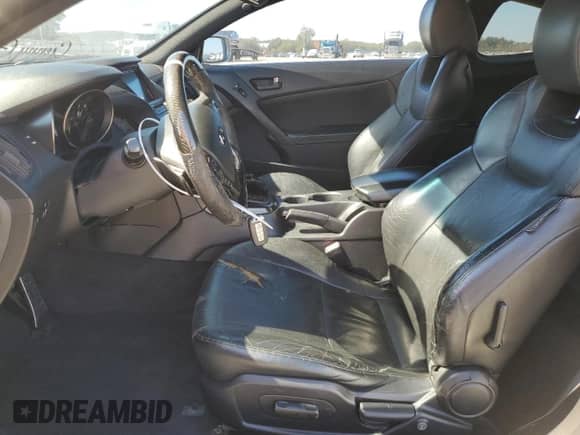 2013 Hyundai Genesis Coupe Grand Touring с VIN KMHHU6KJ1DU103423, выставлен на аукционе Copart как лот 82465725 с пробегом 133 998 миль миль и Списание • Salvage title. История ставок и продаж доступна на DreamBid. Изображение 7.