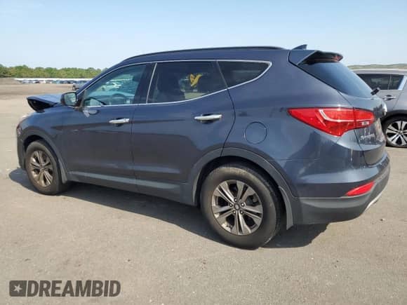 2015 Hyundai Santa Fe with VIN 5XYZUDLB0FG279064, listed as a Copart auction lot 63467345 with 69,935 mi miles and Salvage title. Bid and sale history available at DreamBid. Image 2.