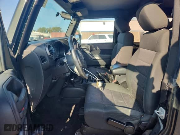 2012 Jeep Wrangler Sport with VIN 1C4AJWAGXCL110511, listed as a Copart auction lot 80013445 with 171,677 mi miles and Clean title. Bid and sale history available at DreamBid. Image 7.