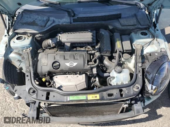 2011 MINI Hardtop with VIN WMWSU3C52BT096248, listed as a Copart auction lot 62008285 with 129,794 mi miles and Salvage title. Bid and sale history available at DreamBid. Image 11.