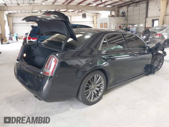 2013 Chrysler 300 C John Varvatos Limited Edition with VIN 2C3CCADG3DH709643, listed as a IAAI auction lot 42601096 with 127,514 mi miles and . Bid and sale history available at DreamBid. Image 4.