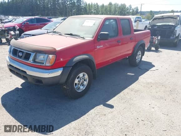 2000 Nissan Frontier XE with VIN 1N6ED27T4YC367352, listed as a IAAI auction lot 42827052 with 159,465 mi miles and . Bid and sale history available at DreamBid. Image 2.