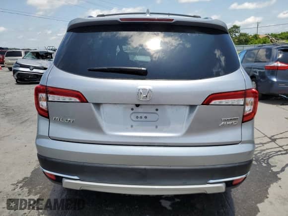 2021 Honda Pilot Touring 8-Passenger с VIN 5FNYF6H9XMB060057, выставлен на аукционе Copart как лот 61585705 с пробегом 57 570 миль миль и Списание • Salvage title. История ставок и продаж доступна на DreamBid. Изображение 6.