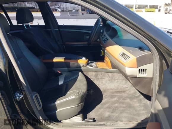 2004 BMW 7 Series 745i with VIN WBAGL63494DP70233, listed as a IAAI auction lot 41622647 with 135,239 mi miles and . Bid and sale history available at DreamBid. Image 5.