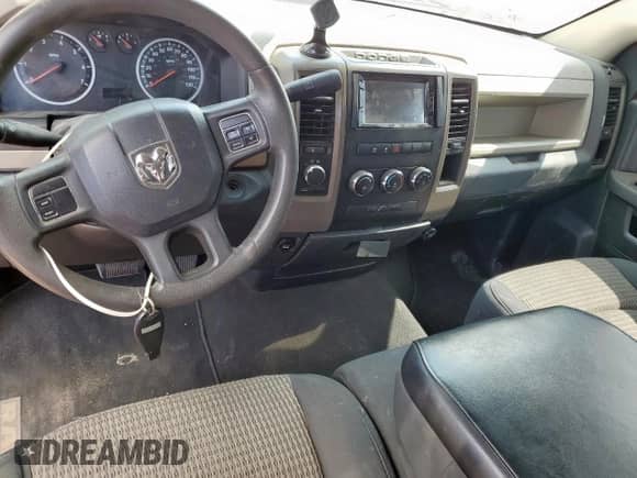 2012 Ram 1500 Express with VIN 3C6JD7AT6CG278287, listed as a Copart auction lot 57054245 with 114,229 mi miles and Salvage title. Bid and sale history available at DreamBid. Image 8.