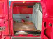 2011 Ford Econoline Cargo Commercial z VIN 1FTSE3EL3BDA38770, wystawiony jako Copart lot #63881715 z przebiegiem 153 607 mil mil oraz Czysty tytuł • Clean title. Historia ofert i sprzedaży dostępna na DreamBid. Obrazek 11.