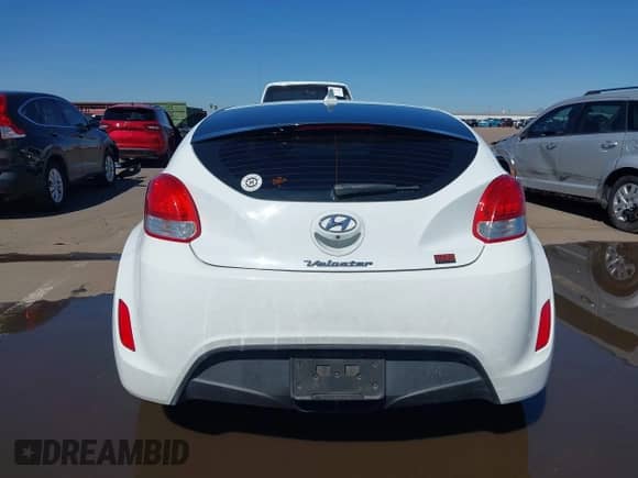 2014 Hyundai Veloster z VIN KMHTC6AD4EU213537, wystawiony jako IAAI lot #43358808 z przebiegiem 54 973 mil mil oraz . Historia ofert i sprzedaży dostępna na DreamBid. Obrazek 16.